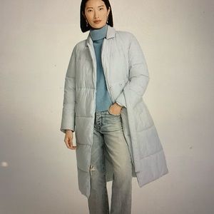 Brand new. With tags. Fits like a L/XL. It is a Medium. Pale Sky color.